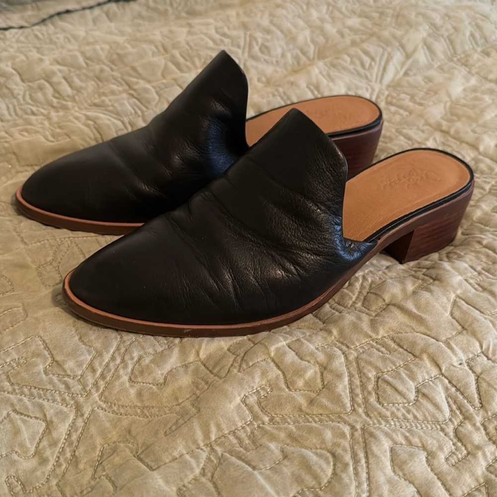 Black heeled mules
